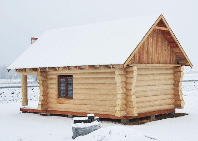 Drewniany dom zimą